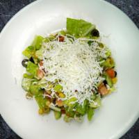 Mediterranean Salad · Chopped romaine lettuce, tomatoes, cucumbers, corn and olives. Topped with feta cheese and m...