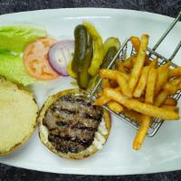 Sirloin Burger · Served with french fries, pickle, lettuce, onion, sliced tomato and mayonnaise.