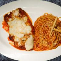 Chicken Parmigiana · Fried chicken cutlet topped with marinara sauce, parmesan cheese and kashkaval cheese. Serve...