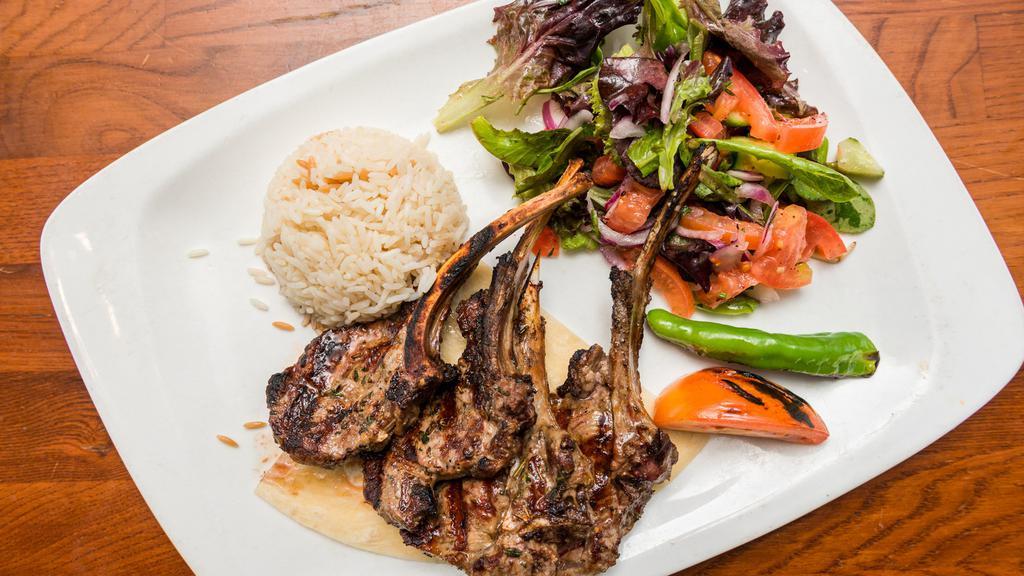 Mixed Grilled Plate · Adana Kebab, Chicken Shish Kebab, Kofta Kebab, Chicken Adana Kebab and Lamb Chops. Served with rice and mixed green salad.