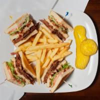 Steak & Cheese Club Sandwich · Served with pickles, lettuce, tomato, mayonnaise, French fries and coleslaw.