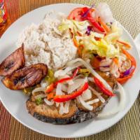 Escovitch King Fish Dinner · served with choice of white rice, rice & peas or yellow rice, cabbage or salad