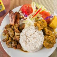 Curry Chicken Dinner · Served with rice & peas or white rice or yellow rice, salad or steamed cabbage