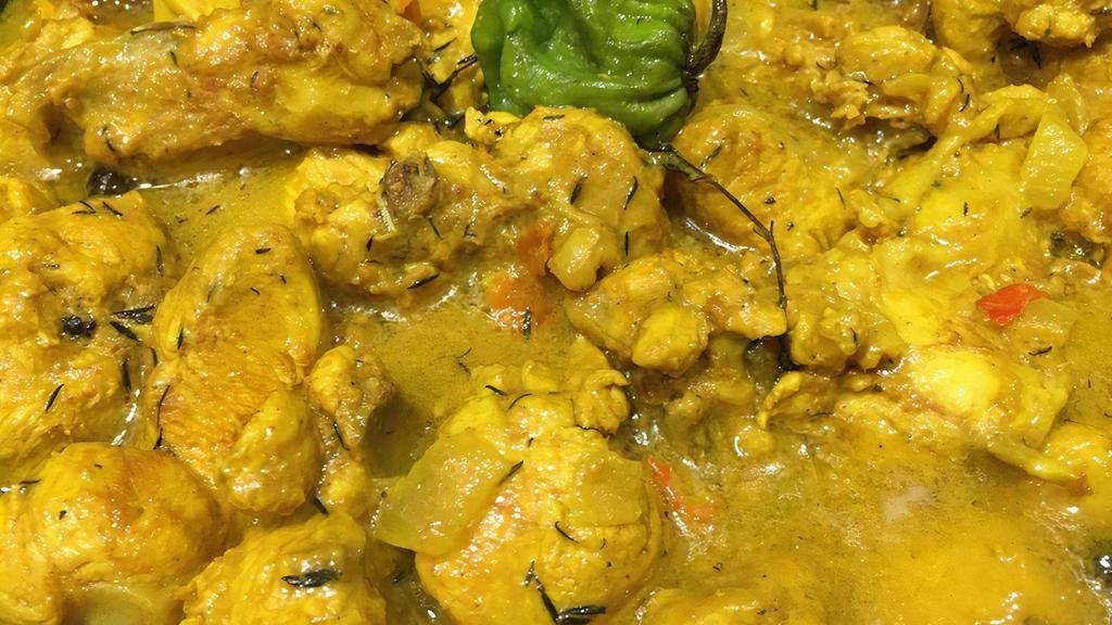 Curry Chicken (Serving) · Chicken pieces are cooked slowly over low heat in an aromatic, deliciously seasoned curry sauce giving the spices time to develop, thereby producing a bold, flavorful dish.  It is usually served with white rice, roti, or dhal puri.