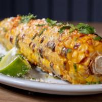 Spicy Street Corn · Avocado lime, aioli, cilantro, queso, fresco.