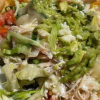 Taco Salad · Served in a crispy flour shell, filled with black beans, crispy lettuce, pico de gallo, so...