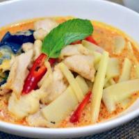 Thai Pineapple Red Curry 泰式红咖喱 · Spicy. Basil, bamboo, bell pepper, string beans and eggplant. Served with rice.