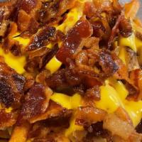 Bacon Cheese Fries · Crispy Golden Fries, Cheddar Cheese Sauce, Crispy Bacon Pieces