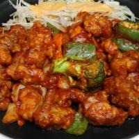 Spicy Chicken With Rice · Comes with a side of white rice.