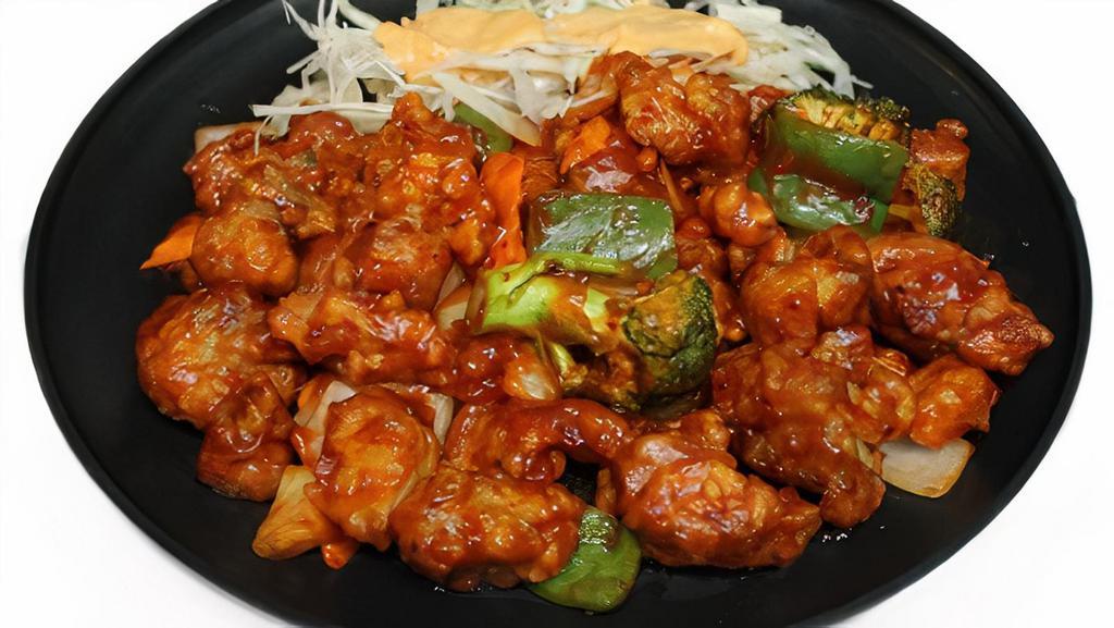 Spicy Chicken With Rice · Comes with a side of white rice.