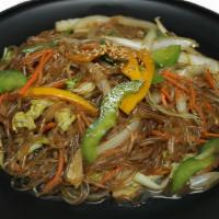 Vegetable Japchae Over Rice  · Prepared with glass(clear) noodles. Comes with white rice. Choice of proteins.