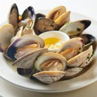 Steamed Clams · Gluten free.  White wine, butter, and parsley.