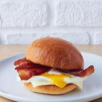 Breakfast Sandwich  · egg & cheese with your choice of bacon, sausage, or pork carnitas (+2) on a brioche bun