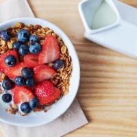 Granola Bowl  · choice of granola and milk with two toppings