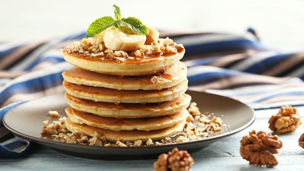 Banana Nut Pancakes · Delectable pancakes with nutty bananas.