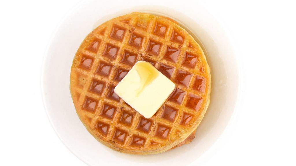 Waffles With Butter & Syrup · Hot off the iron waffles with butter and syrup.