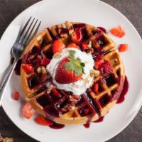 Waffles With Fresh Strawberries · Hot off the iron waffles with fresh strawberries.