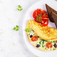 Mexican Omelette · Three  egg omelette bite delight with jalapeño peppers, fresh tomato served with home fries ...