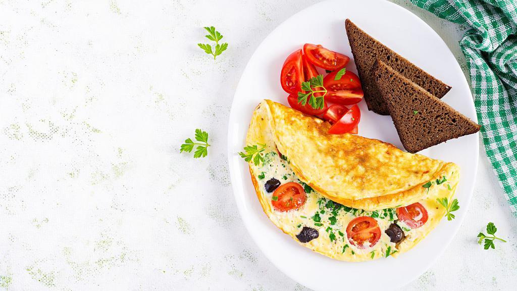 Mexican Omelette · Three  egg omelette bite delight with jalapeño peppers, fresh tomato served with home fries and toast.