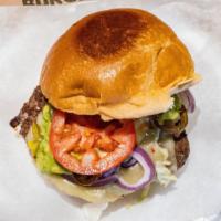 Flaming Burger · Recommended. Beef burger, Pepper Jack cheese, fresh salsa, jalapeños, lettuce, tomatoes, oni...