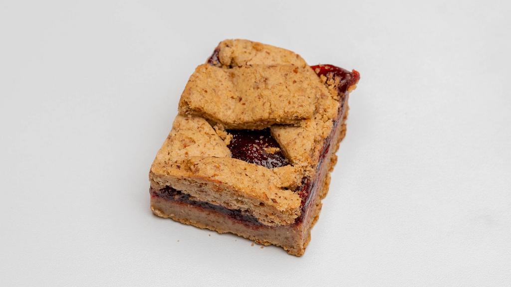 Raspberry Hazelnut Bar · Vegan, gluten-free. This one is pretty straightforward. A mixture of gluten-free flours and raspberry jam makes this one of our tastiest vegan treats. Ingredients: Hazelnut Flour, Organic Cane Sugar, Almond Flour, Certified Gluten-Free Oat Flour, Raspberry Jam, Coconut oil & Xanthan.