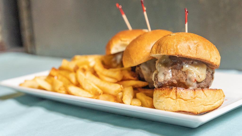 Kobe Beef Sliders · Grilled at your preference, melted pepperjack, onion jam, and brioche rolls.