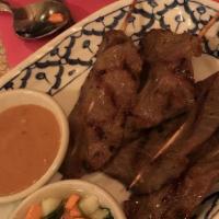 Satay · 4 pieces. Choice of chicken or beef marinated with thai herbs and grilled on bamboo skewers....