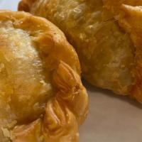 Curry Puffs · 3 pieces. Ground chicken with potatoes, onions, and yellow curry powder filling in fresh pas...