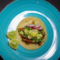 Al Pastor · Achiote pineapple roast pork topped with pineapple, cilantro, onions and radish
