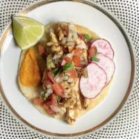 Lime Chicken  · Grilled lime chicken breast topped with pico de gallo and radish