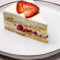 Tres Leches Cake With Strawberries · Soft and ultra moist sponge cake soaked with a condensed milk, evaporated milk, and cream wi...