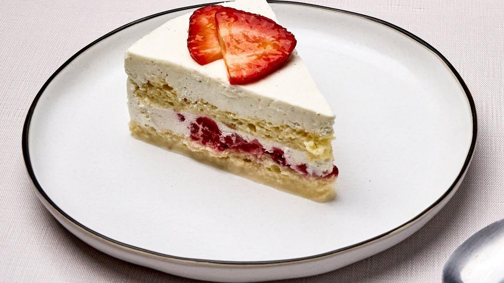 Tres Leches Cake With Strawberries · Soft and ultra moist sponge cake soaked with a condensed milk, evaporated milk, and cream with strawberries in the center.