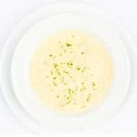 Soupa Avgolemono · Rich chicken soup finished with egg & lemon.