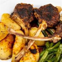 Paidakia Thedrolivano · Charcoal-grilled lamb chops, roast potatoes & fresh rosemary.