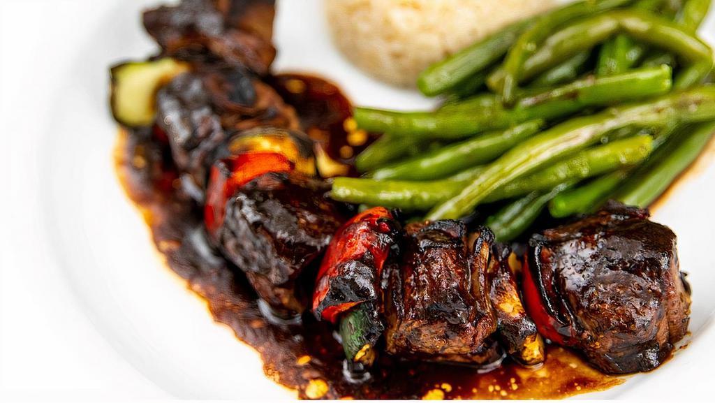 Filet Mignon · Charcoal-grilled kebab of filet mignon served with rice & string beans.