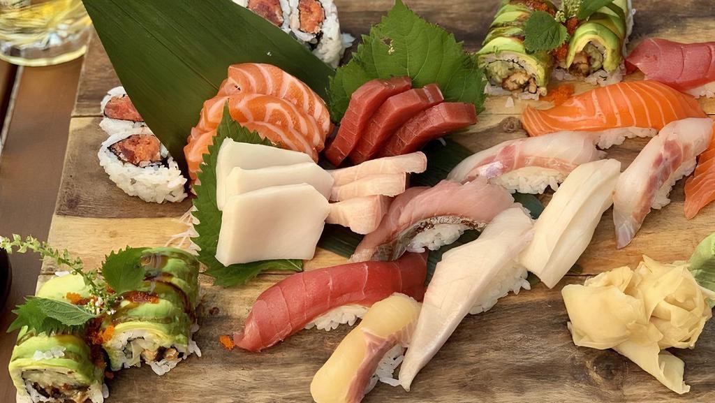 Sushi Sashimi For 2. · 12 slices of assorted sashimi, 10 pcs of assorted sushi, Dragon roll, spicy tuna roll. All are chef's choice. No substitution.