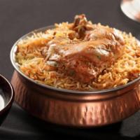Hyderabadi Chicken Matka Biryani · Fresh authentic chicken biryani in a special sealed clay pot.