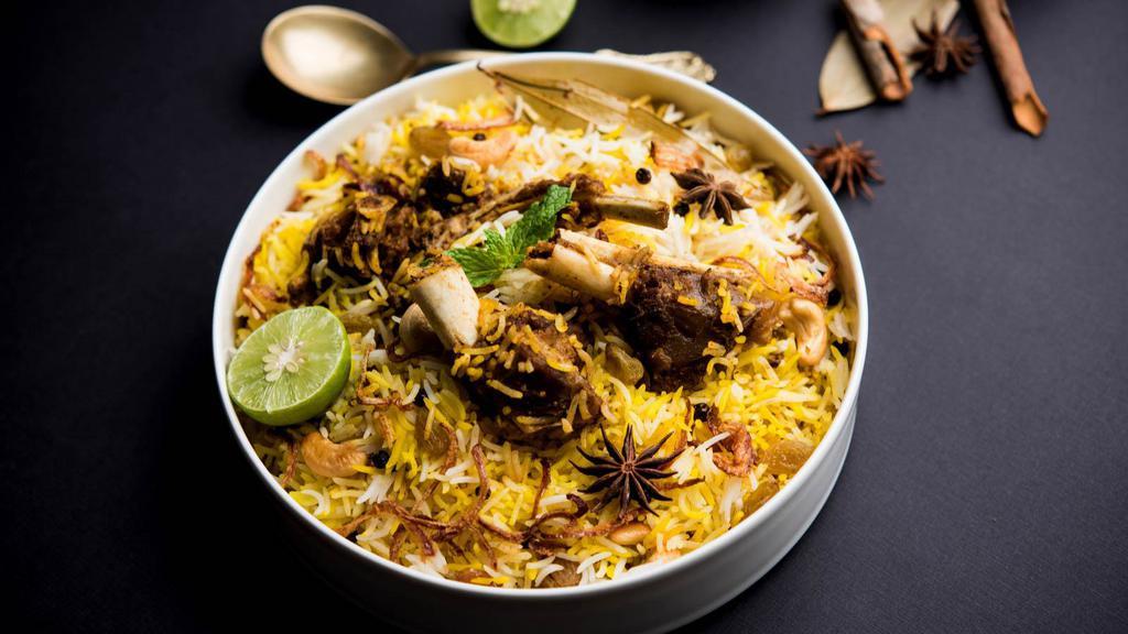 Lamb Biryani · Fresh basmati rice cooked with marinated lamb with Indian herbs, spices and mint leaves.