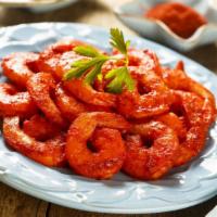 Tandoori Shrimp · Yummy shrimp marinated in authentic spiced yogurt and herbs in charcoal oven.