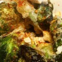 Crispy Brussel Sprouts · Battered and deep fried brussel sprouts with homemade sweet and sour soy sauce and red peppe...