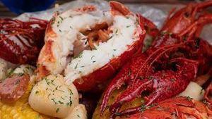 1 Lobster Tail, Dungeness, & Crab Leg 1 Cluster · 