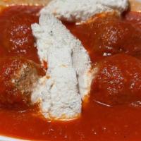 Meatballs - · Ground meat rolled into small spheres, prepared with bread crumbs, minced onion, eggs, butte...