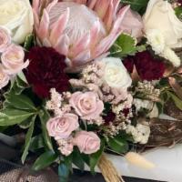 Signature Wrapped Bouquet · Make a beautiful statement with our adore signature wrapped bouquet. A mix of premium roses,...