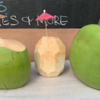Young Hawaiian Coconut · Freshly opened young Hawaiian coconut with naturally sweet water.