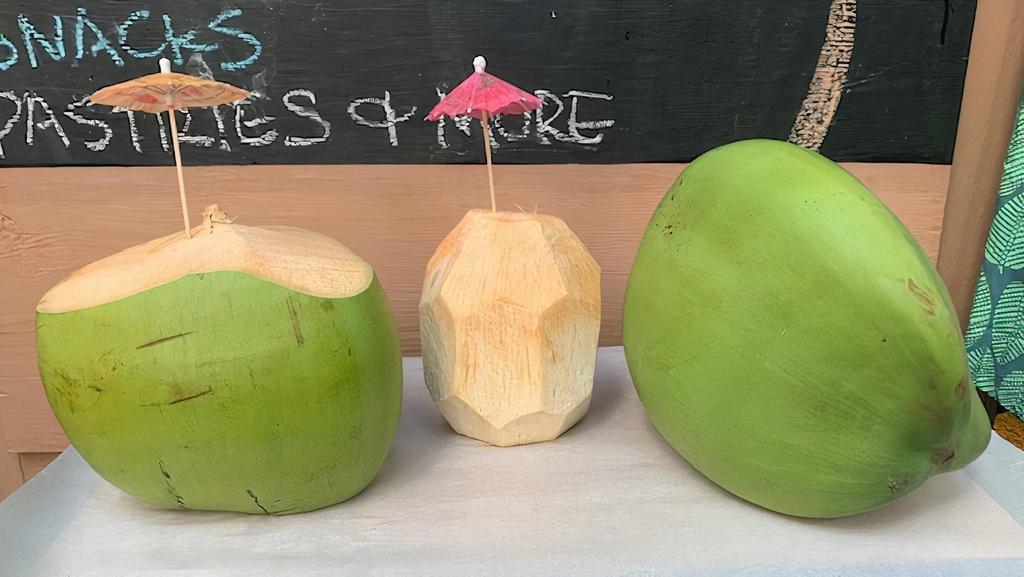 Young Hawaiian Coconut · Freshly opened young Hawaiian coconut with naturally sweet water.