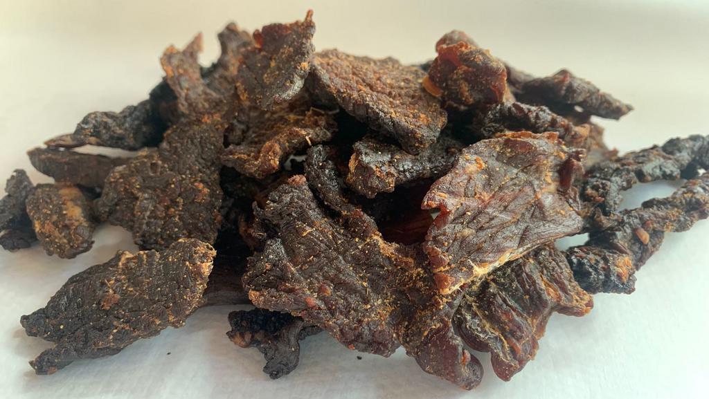 Hawaiian-Style Beef Jerky · Homemade dehydrated Bottom-Round Beef, marinated in freshly-squeezed Hawaiian Pineapple, fresh ginger, soy and cayenne pepper.
