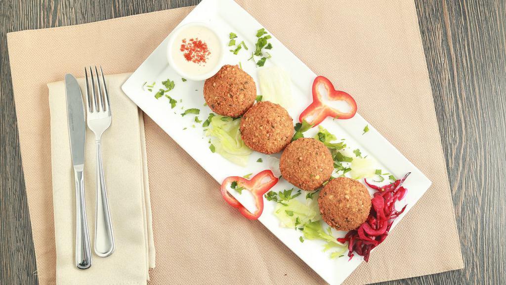 Falafel · Ground chickpeas, garlic, onion, parsley, and our Mediterranean spices. Served with Tahini Sauce