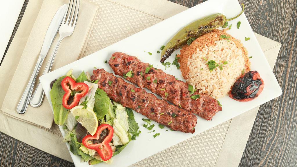 Adana Kebab · Skewered ground meat marinated with our homemade seasoning.
