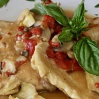 Chicken Contadina · Sautéed chicken breast with artichokes and mushrooms in a light red sauce. Served with your ...