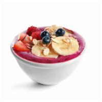 Regular Açaí Bowl · Classic açaí berry bowl with banana, almond milk, kiwi, pineapple, and your choice of granol...